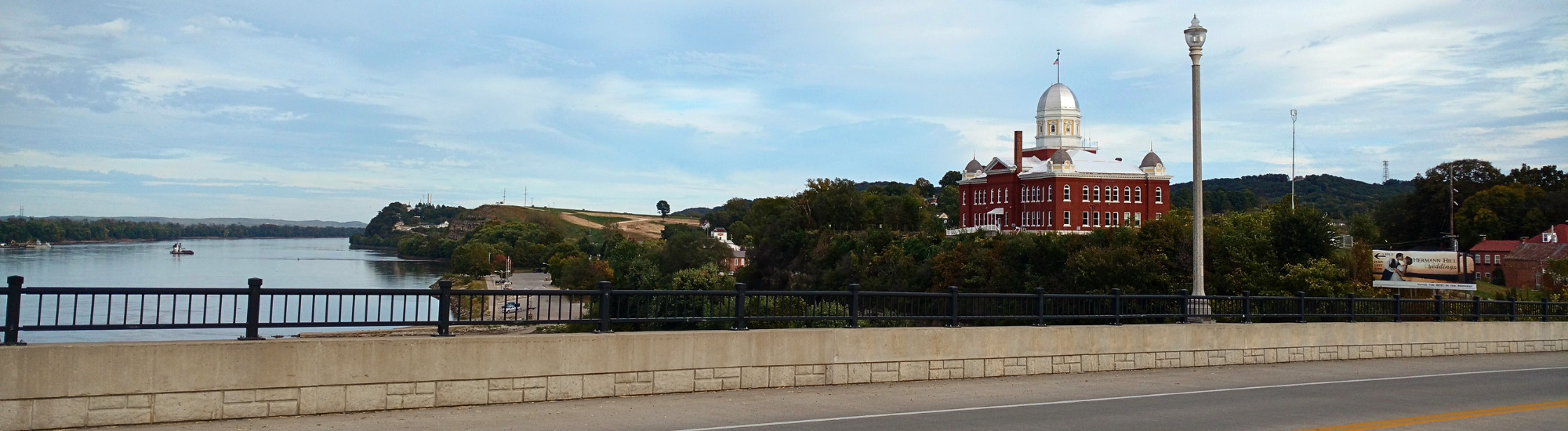 Trail along the river featuring historic areas